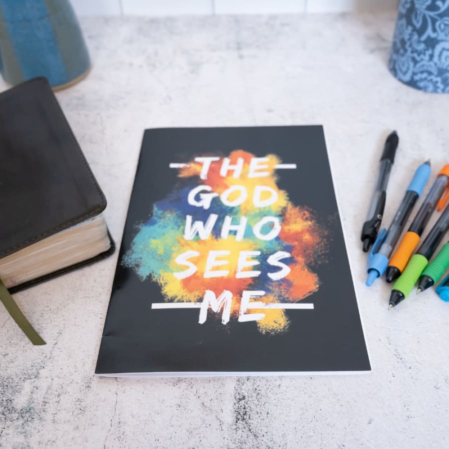 bible study for teens on marble counter with leather bible and colored pens
